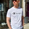 Paolo Pecora x Champion TS blanc face Paolo pecora x champion t-shirt manches courtes blanc noir Revolt Orléans